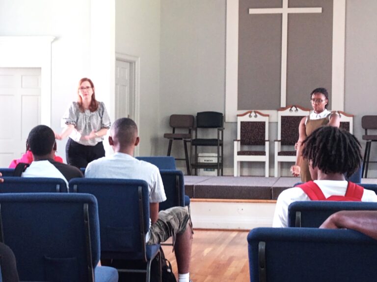 Gerber Advises Camp REACH Student Writers